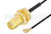 Reverse Polarity SMA Female Bulkhead to UMCX 2.1 Plug Cable Using 0.81mm Coax, RoHS